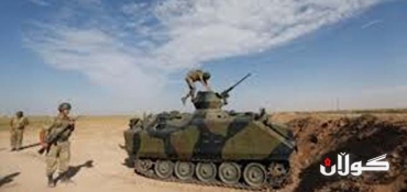 Syria keeping military 10 km away from Turkish border