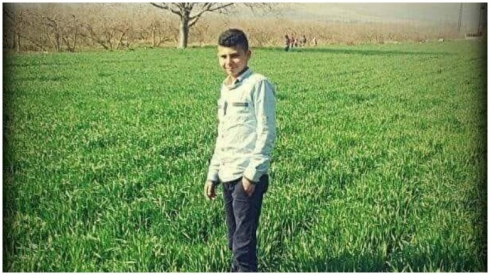 Efrîn.. Grûpên çekdar serê gencekî 16 salî dibirin