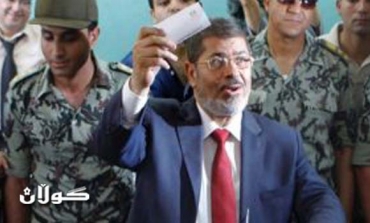 Egypt's new president begins struggle for power