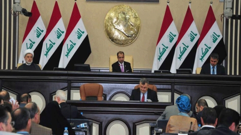 Parlementoya Iraqê parêzbendiya serokê xwe radike