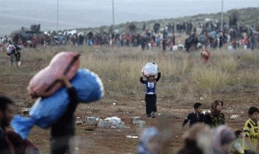 Artêşa Esed Kurdan topbaran dike