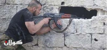 Syria death toll tops 100,000, rebels lose border town