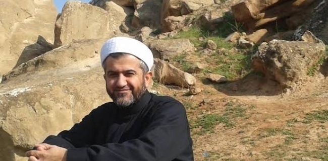 مامؤستايةكى ئاييني لة خورماتوو: هةر كورديَك ببيَتة حةشدى شةعبي سيَ جار تاوانبار دةبيَت 