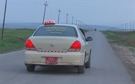شۆفێرێکی تاکسی بێ بەرامبەر پێشمەرگە و خێزانی شەهیدان دەگوازێتەوە 