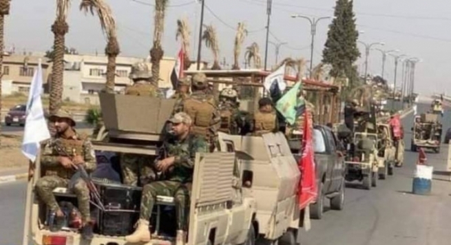 لە شنگال میلیشیاكانی حەشدی شەعبی لەبری كشانەوە نماییشی سەربازی دەكەن