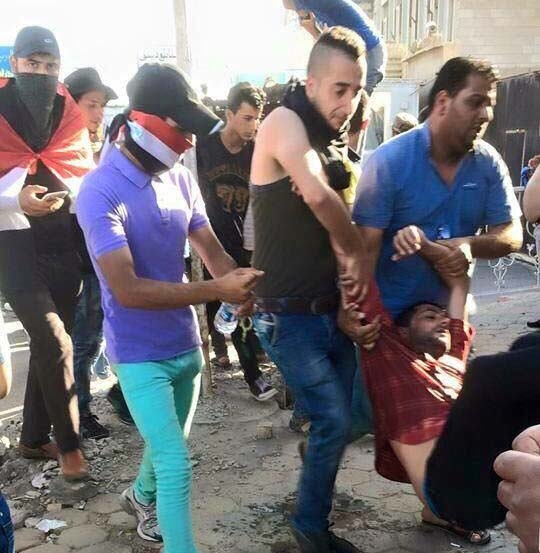 زیاتر لە ١٠٠ بریندارو جەند کوژراوێک لەخۆپیشاندانەکانی بەغدا