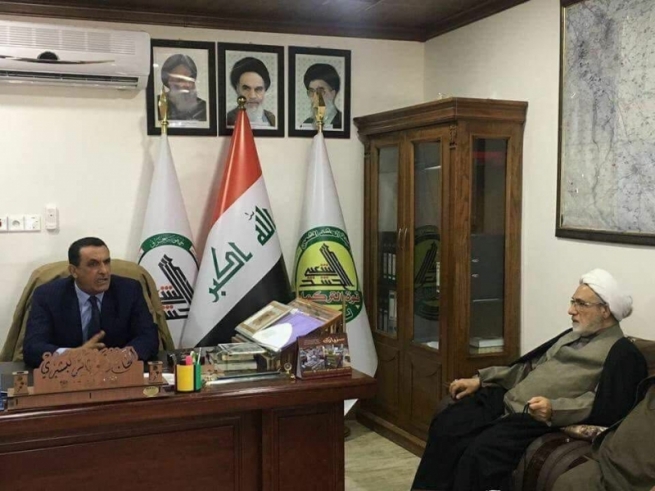وێنەیەكی پارێزگاری سەپێندراوی كەركووك لە بارەگای حەشد هەرا دەنێتەوە