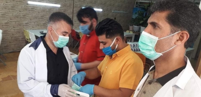 تەندروستیی هەڵەبجە دەمامک بەسەر خاوەن کارەکاندا دابەش دەکات