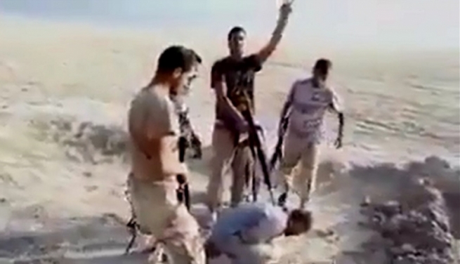 میلیشیاكانى حه‌شدى شه‌عبى هاوشێوه‌ى داعش هاووڵاتییه‌ك گوله‌باران ده‌كه‌ن