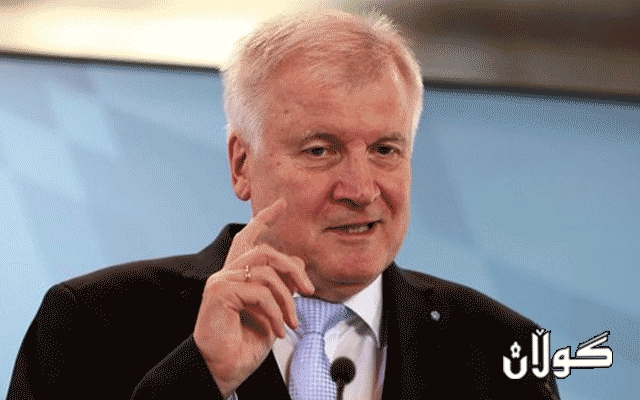 وەزیری ناوخۆی ئەڵمانیا، هەڕەشەی دەست لەکارکێشانەوە دەکات