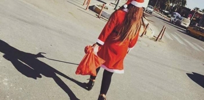 به‌وێنه‌: كچێك له‌ به‌غدا خۆى ده‌كات به‌ پاپانووئێل 