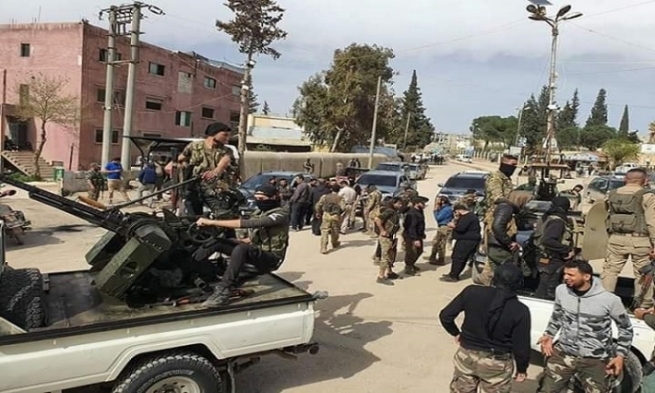 لە سەرێ کانی شەڕ لەنێوان چەکدارانی میلیشیایەکی سەر بە تورکیا دروست دەبێت