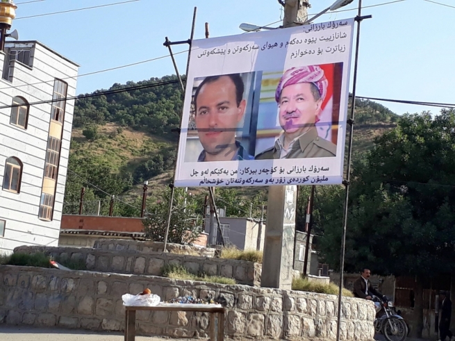  وێنەی سەرۆك بارزانی و كۆچەر بیركار لە مەریوان هەڵدەواسرێ 
