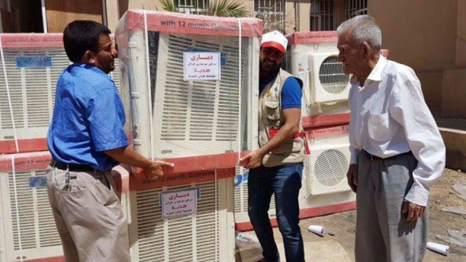  دەزگای خێرخوازیی بارزانی 59 فێنککەرەوە بۆ ئاوارەکانی کەرکووک دابین دەکات 