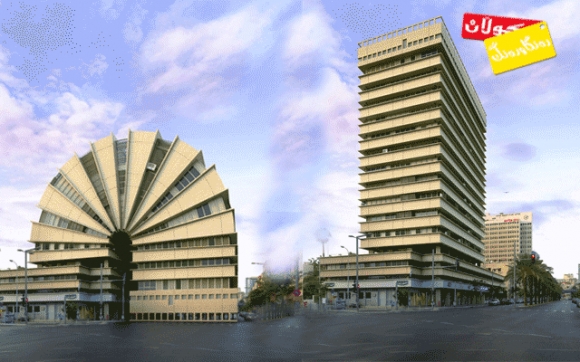 باڵەخانەیەك دەچەمێتەوە!