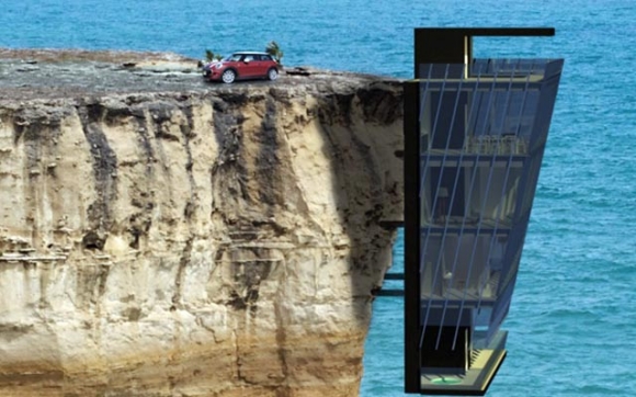 خانوو لەسەر لێواری دەریا و لوتكەی كێو