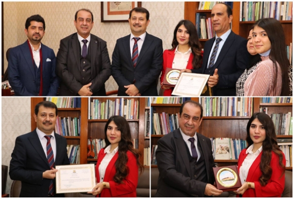 بەخشینی دیاری ڕێزلێنان بە كچە شێوەكارێك